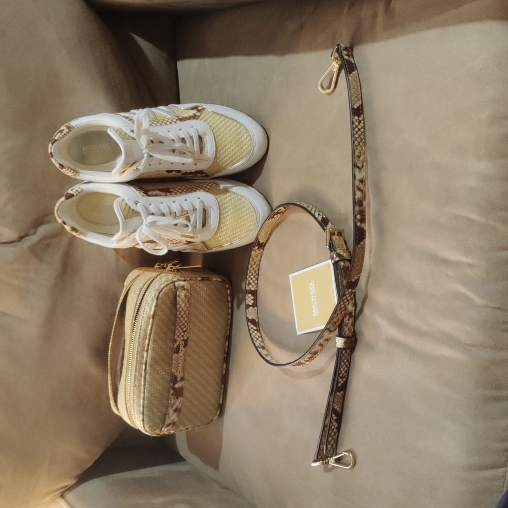 Authentic Michael kors crossbody/clutch/handbag with tennis shoes.